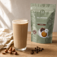 Koffie hazelnoot shake gemaakt met Lisa's whey eiwitpoeder, met de zak ernaast