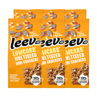Zes zakken Leev Mini Crackers Multiseed gestapeld, 6 x 85 gram