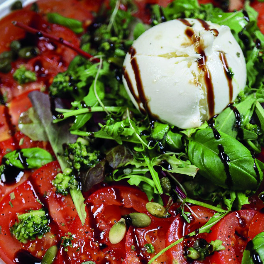 Tomaten carpaccio met burrata