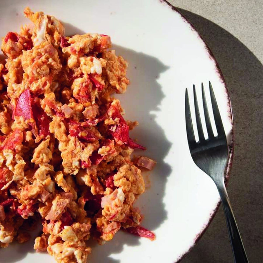 Scrambled egg met tomaat en bacon